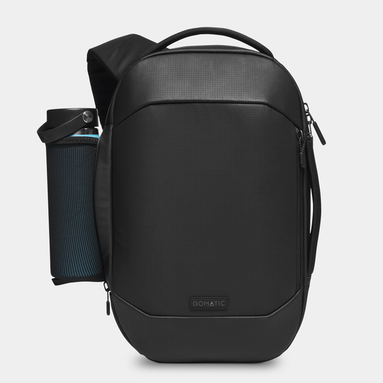 Gomatic Navigator RS Pack 10L Black Front View with bottle#color_black