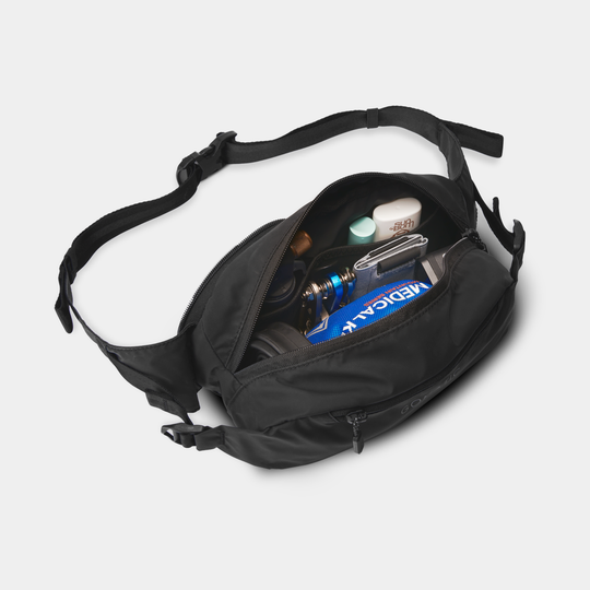 Gomatic Navigator Collapsible Sling 3L Black Front Angle View With Straps and Items Inside